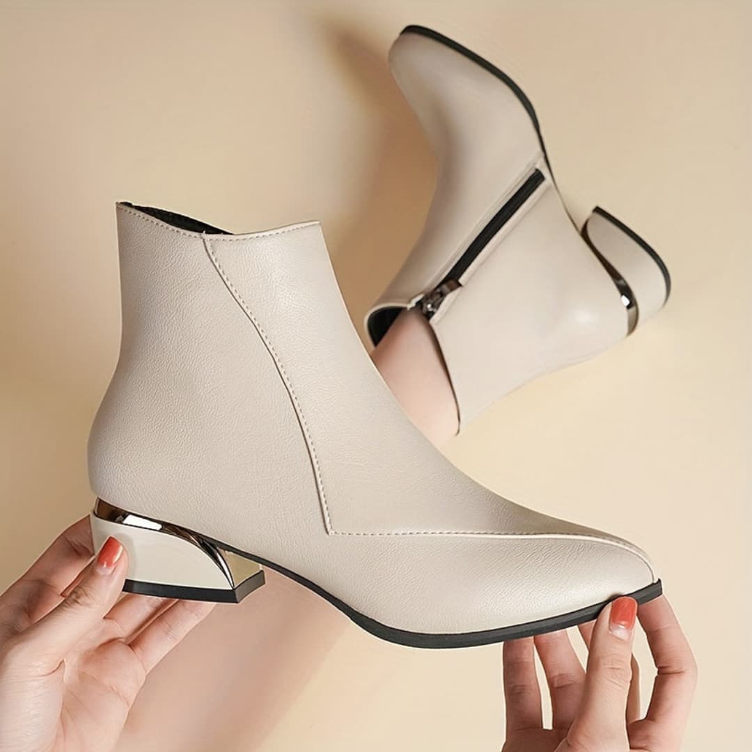 Make an impression with these chunky low-heeled ankle boots