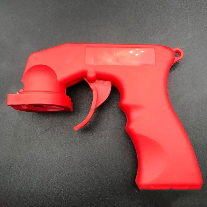 Nærbilde av ergonomisk aerosolsprøytepistol, viser dyse for presis og kontrollert malingsspray.