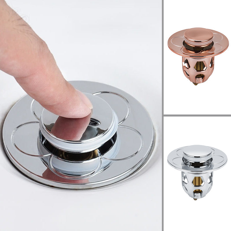 "Allsidig lekkasjestopper i blankt metall med innebygd kurv, passer ulike avløp. Rustfritt, holdbart, og elegant design."