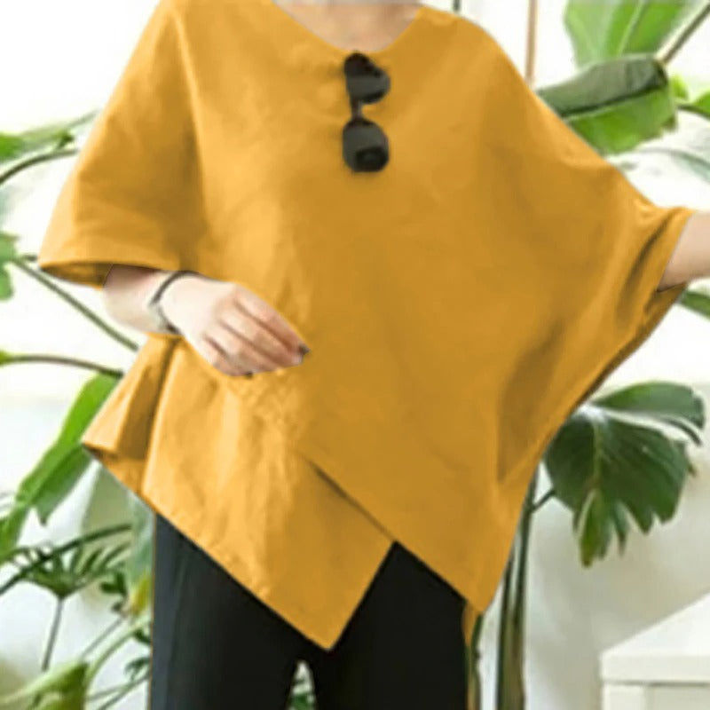 Elegant gul asymmetrisk bluse for kvinner med halvermede ermer. Komfortabel mote for fest eller hverdag.
