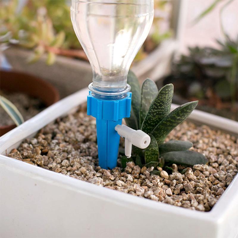 "Automatisk vanningssystem for planter, grønn plastkonstruksjon, enkel montering, justerbar vannmengde, miljøvennlig design."