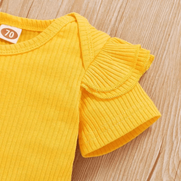 Nydelig babysett med gult solsikketrykk på langermet topp og matchende bukse i myk bomull