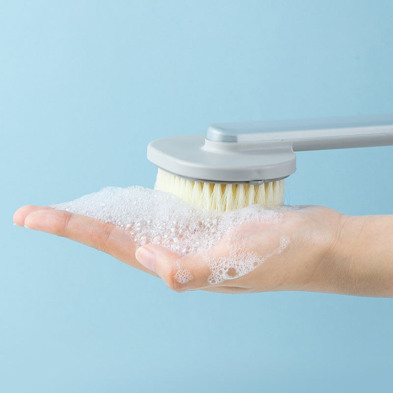 Bademassasjebørste med langt skaft, ergonomisk design og innebygd dusjgelé, ideell for eksfoliering av hele kroppen.