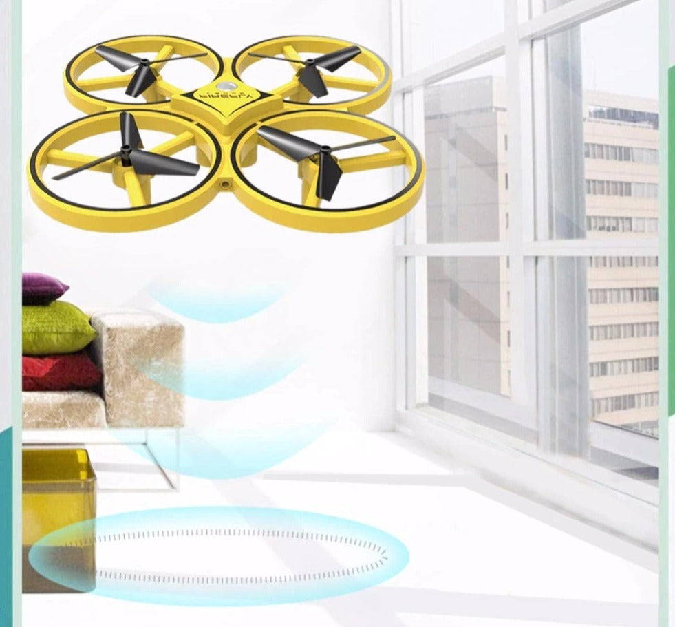 Radiostyrt leke drone for barn, gul, med LED-lys og hindringsensor for kveldsflyving.