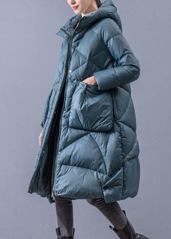 Blågrønn dame overdimensjonert hettegenser med praktisk glidelås. Perfekt for en trendy og avslappet look i hverdagen.