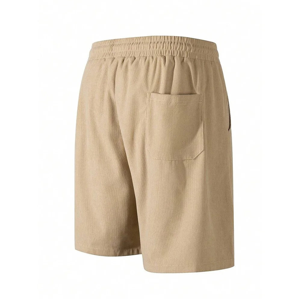 "Blå corduroy-shorts for menn med myk struktur, avslappet passform, ideell for casual stil og uformelle utflukter."