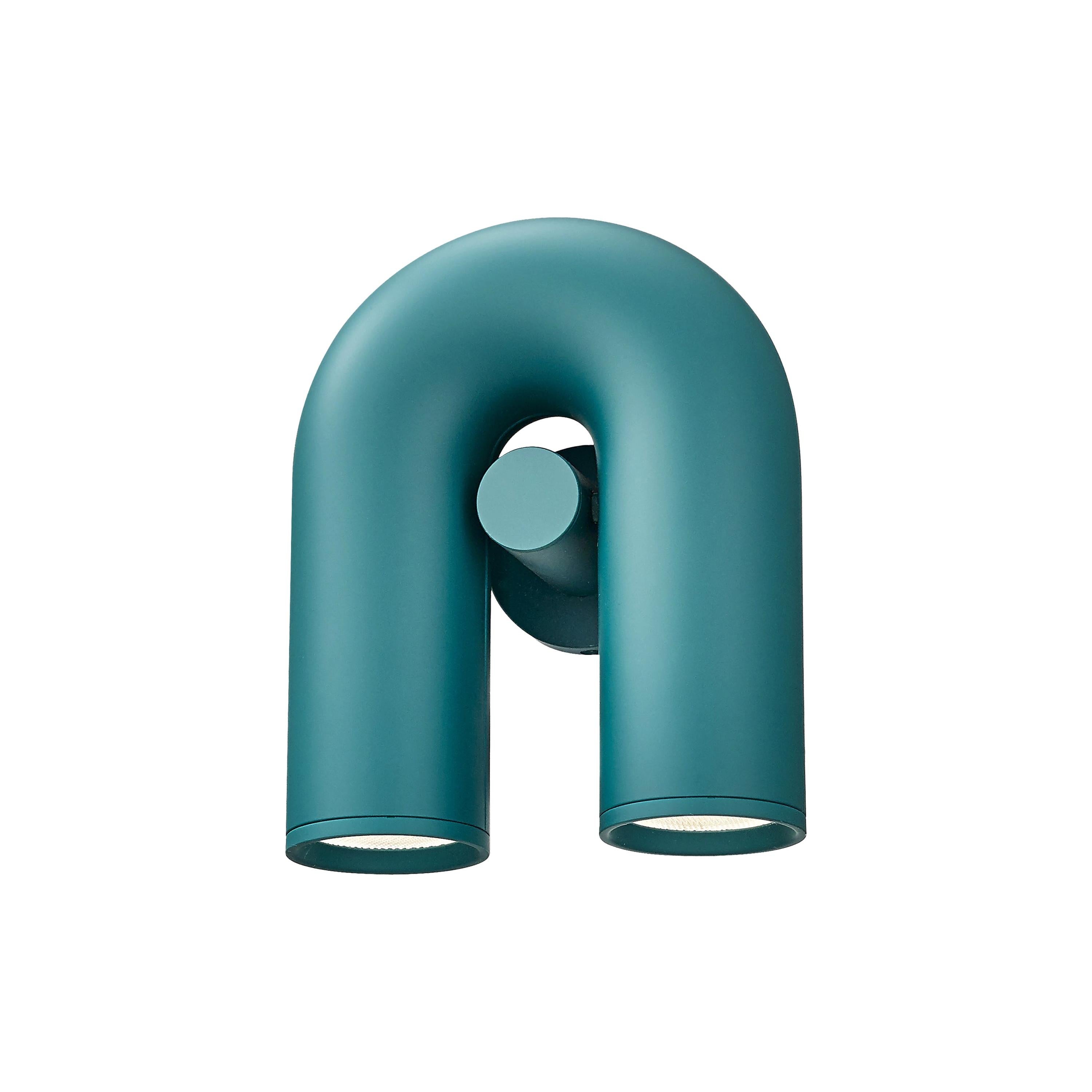 "Cirkus justerbar LED vegglampe med U-formet modul, elegant design for moderne innendørs belysning."