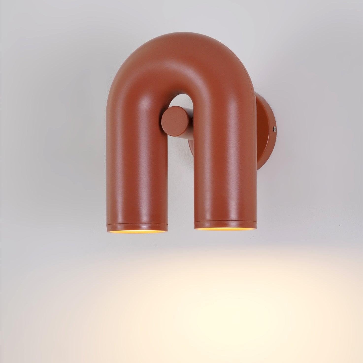 "Cirkus justerbar LED vegglampe med U-formet modul, elegant design for moderne innendørs belysning."