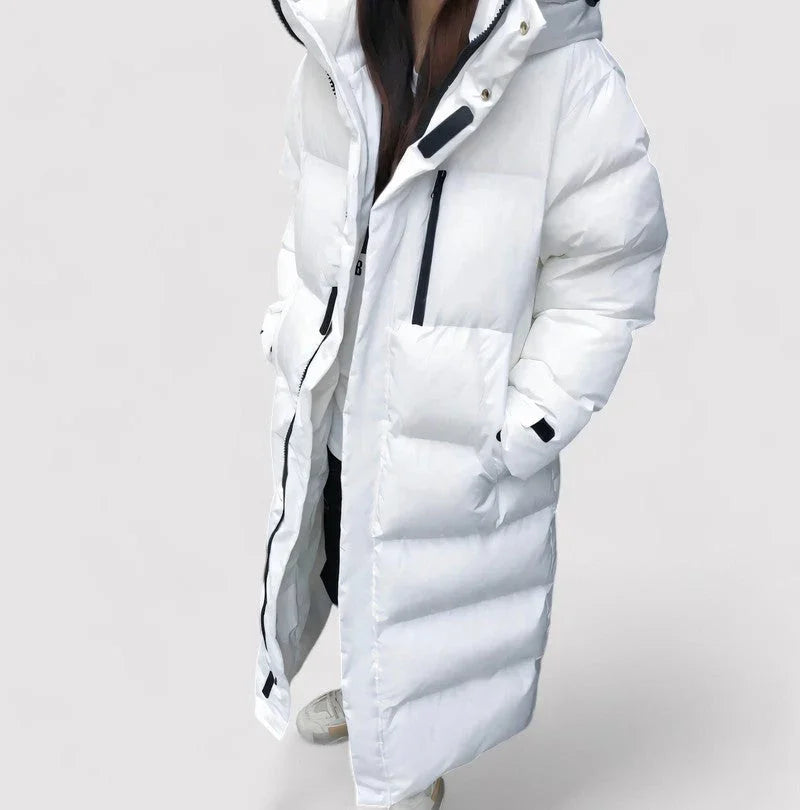 Dame vanntett og varm lang pufferparka, perfekt som stilig vinterjakke og yttertøy for kaldt vær.