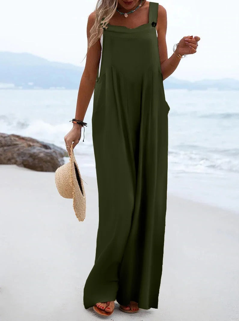 Sommerens must-have: Damejumpsuit med brede bukseseler, komfortabel og vidbeint for varme dager.