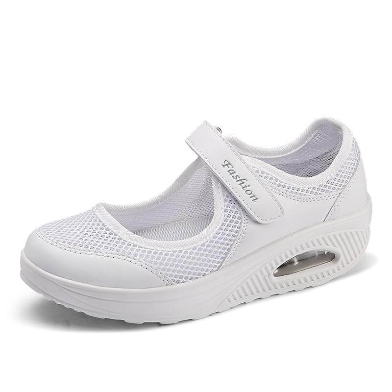 Lettvekts fritidssko: Fargemiks av hvitt og rosa i pustende sneakers for kvinner, svært komfortable.