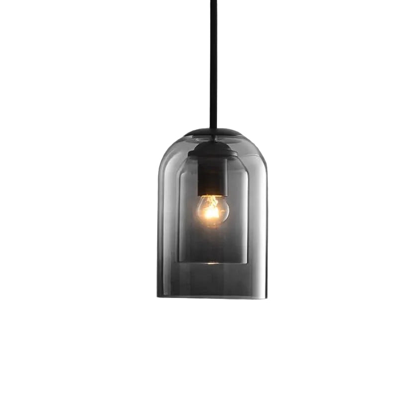 Dobbel pendellampe i røykgrått glass for elegant, moderne belysning til spisestue eller stue.