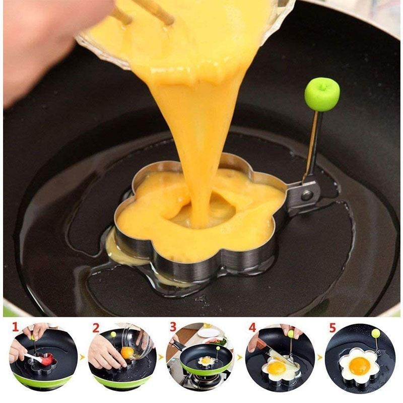 "Eggformer i rustfritt stål, non-stick, forskjellige mønstre som blomst, hjerte, rund, mus og stjerne på lys bakgrunn."