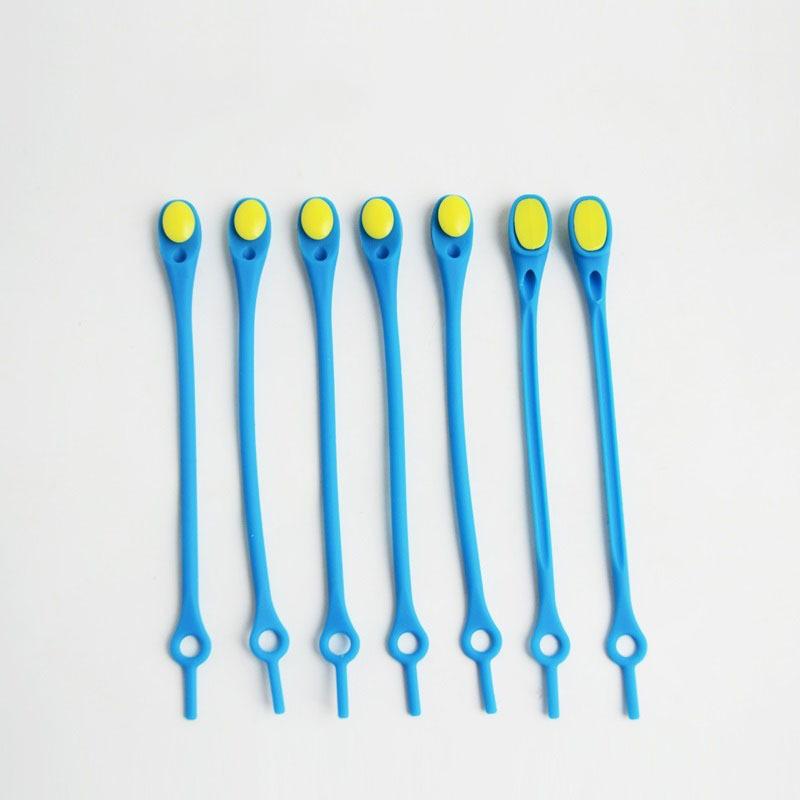 Elastiske flerfargede silikonskolisser for sko, vises i regnbuens farger, perfekt for enkel og stilfull skooppgradering.