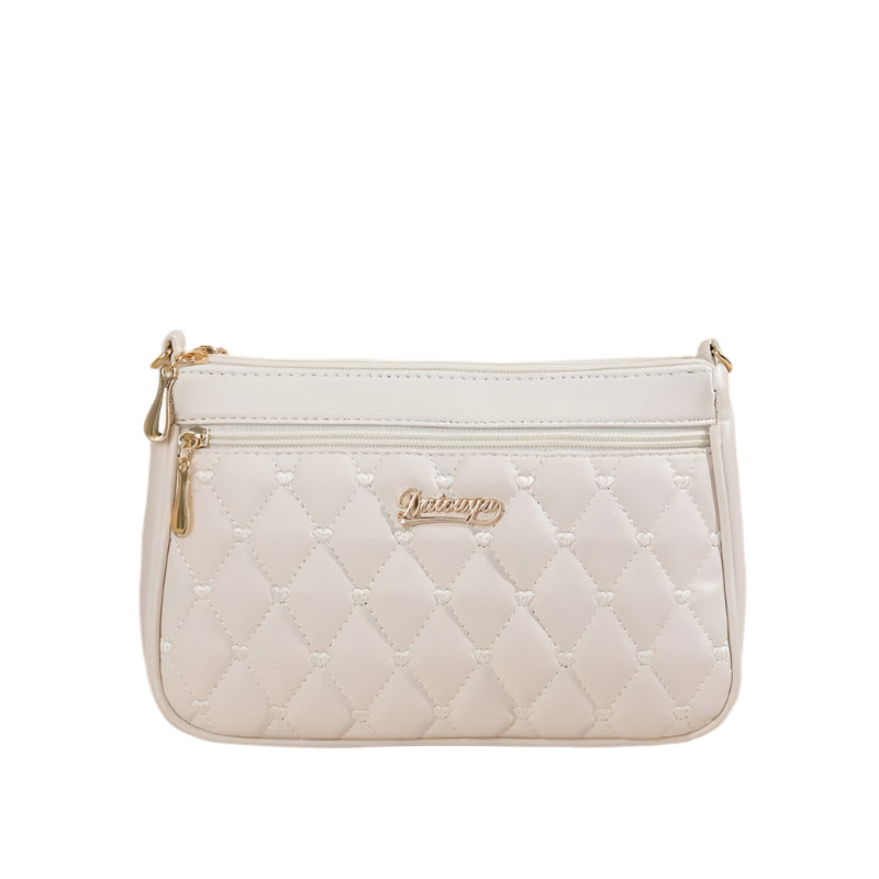 Bakside av brodert crossbody-veske i PU-skinn, med diskret lomme, perfekt for kvinner.