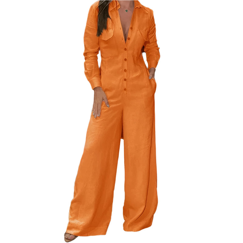 Trendy oransje dame jumpsuit, langermet med krage og elegante vide ben, for en moderne look.