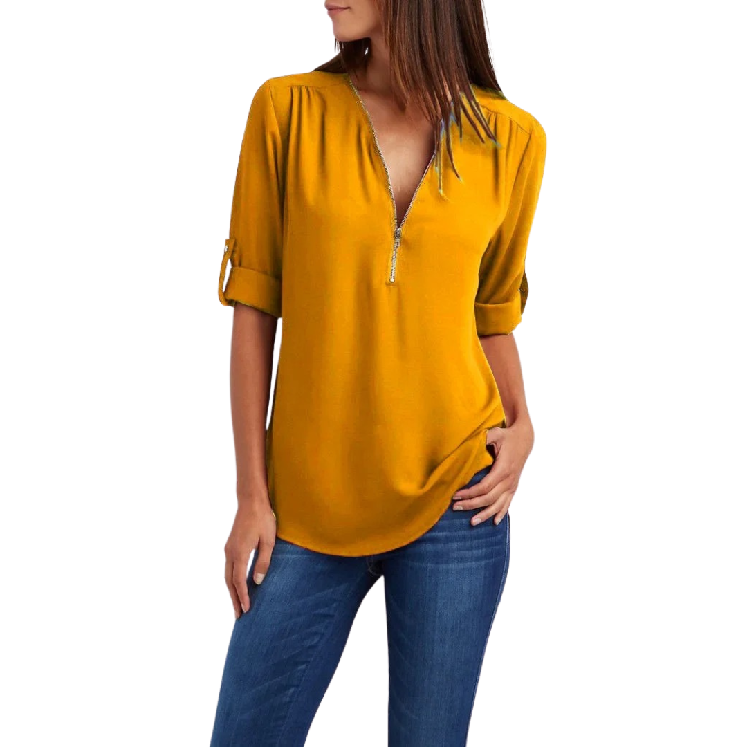 Trendy dyp V-hals bluse for kvinner, fremhever en chic og avslappet stil.