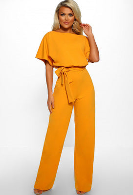 Damejumpsuit med vide ben og snøring i midjen, gir et elegant og komfortabelt antrekk for fest og hverdag.