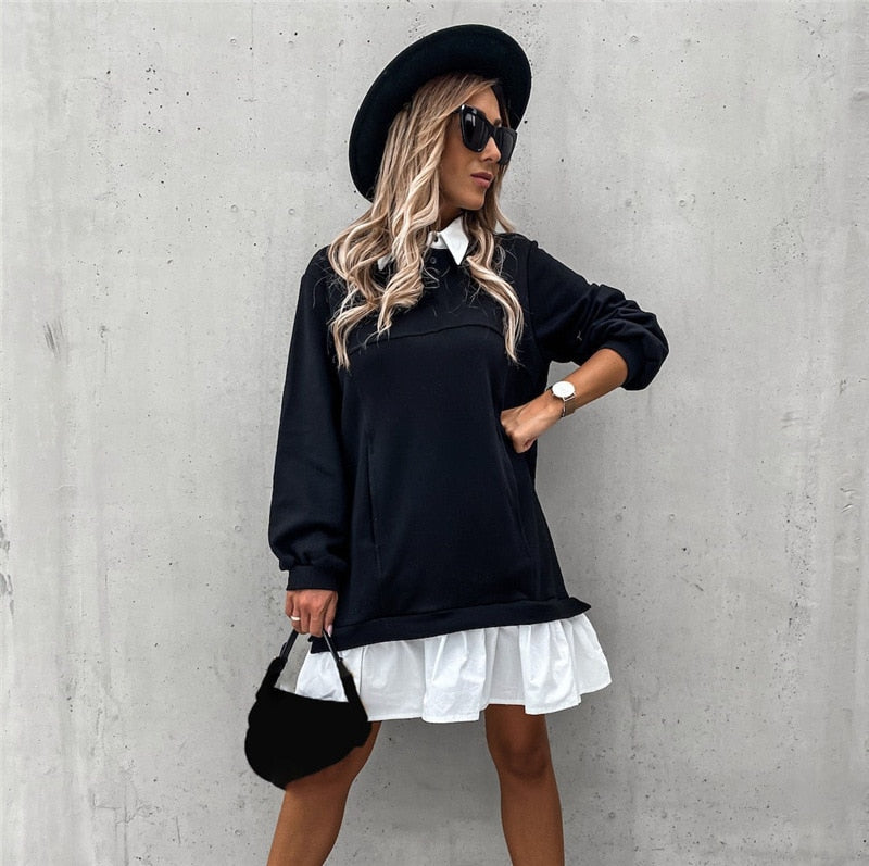 Minikjole i elegant design med krage og knappelukking, perfekt som casual hĂžstkjole