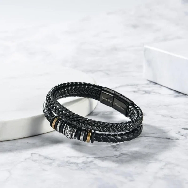 "Elegant flettet skinnarmbånd for menn med rustfritt stål magnetlås i svart; stilfullt, maskulint design."