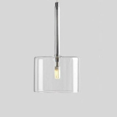 Glass taklampe som skaper stemning, perfekt som elegant belysning over spisebord.