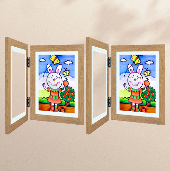 "Elegant, hvit 10x12,5 ramme for barnekunst, med glassfront og magnetlukking, ideell for tegninger og malerier."