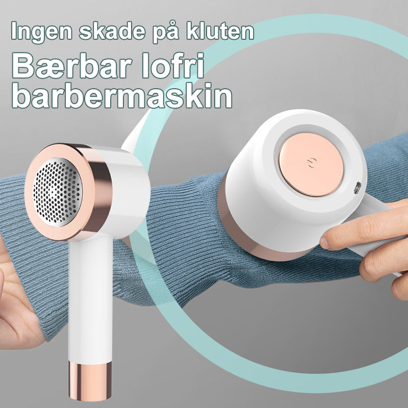 Elegant hvit nuppefjerner i ABS/PC og stål for skånsom oppfriskning av klær. Ergonomisk og trådløs med sikkerhetsmekanisme.