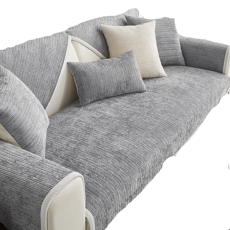 Elegant Jacquard benktrekk, et vaskbart sofatrekk som tilbyr stilig møbelbeskyttelse i stuen.