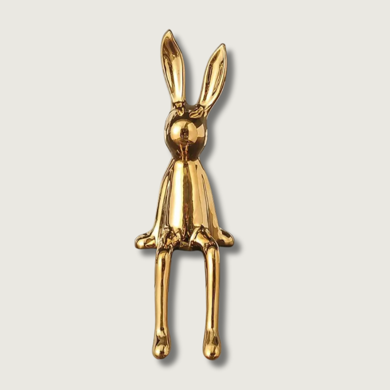Minimalistisk kaninskulptur laget av metall, perfekt for moderne interiørdekor