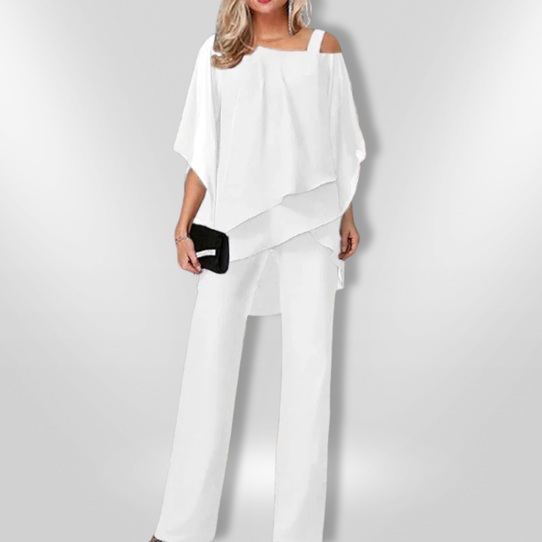 Premium kvinneklær: Chic asymmetrisk topp og elegant bredbukse for formelle eventer.