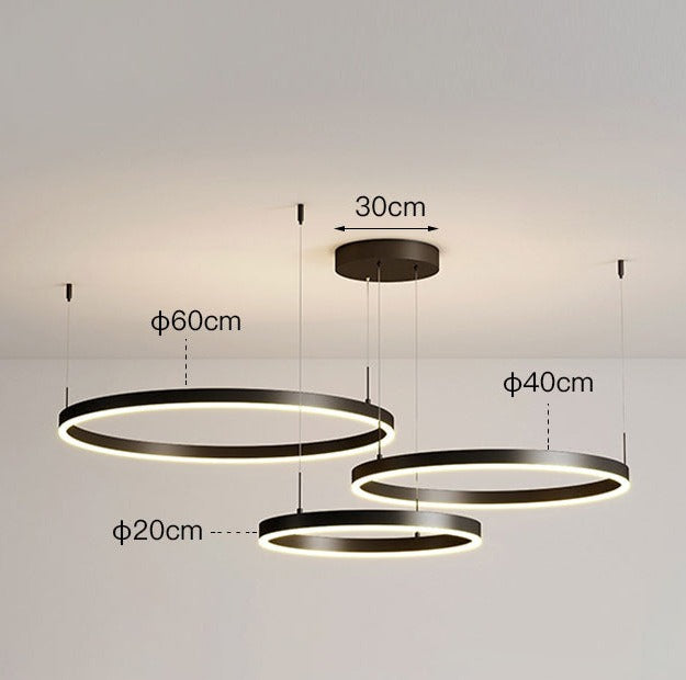 "Elegant LED ringlight taklampe i minimalistisk stil med sammenflettede ringer for moderne belysning."