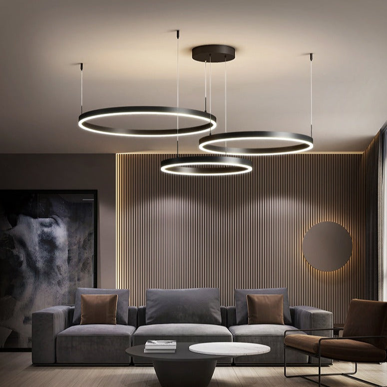 "Elegant LED ringlight taklampe i minimalistisk stil med sammenflettede ringer for moderne belysning."