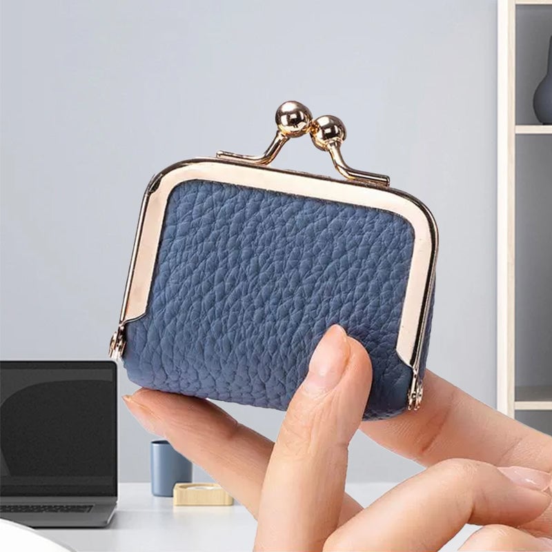 "Elegant mini smykkeskrin i ekte skinn med retro design, reisevennlig, tilgjengelig i flere stilige farger."