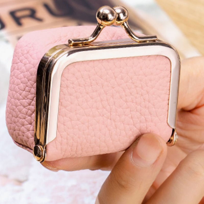 "Elegant mini smykkeskrin i ekte skinn med retro design, reisevennlig, tilgjengelig i flere stilige farger."