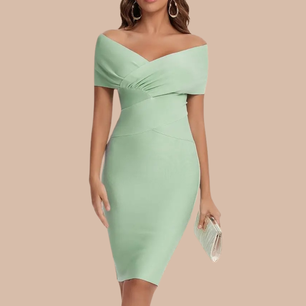 Elegant off-shoulder kjole i behagelig materiale. Ideell for en stilfull look på sommerfesten.