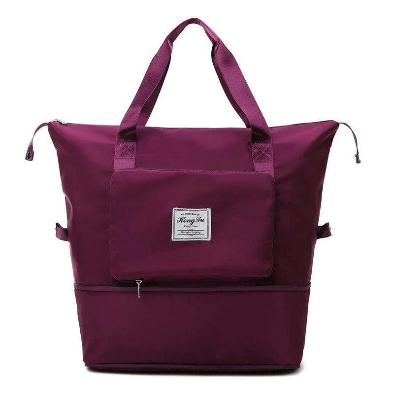 Allsidig reiseveske i sort vanntett materiale, ideell som helgeveske og dagligbag med smarte rom.