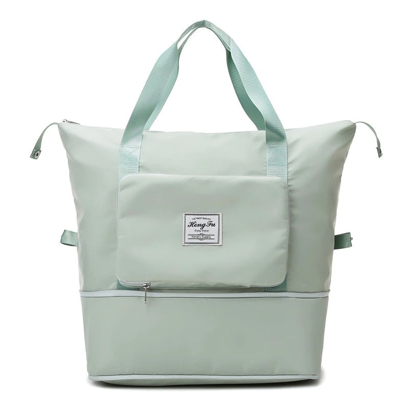 Detaljert bilde av den utvidbare funksjonen på en sort reiseveske, optimal for helgeturer og reise.