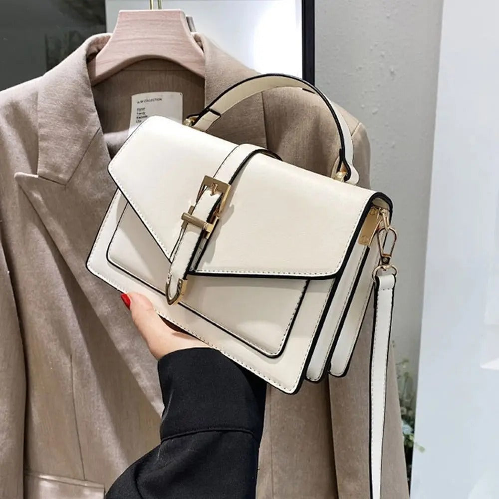 Stilfull beige dameveske, crossbody-modell, ideell for daglig bruk.
