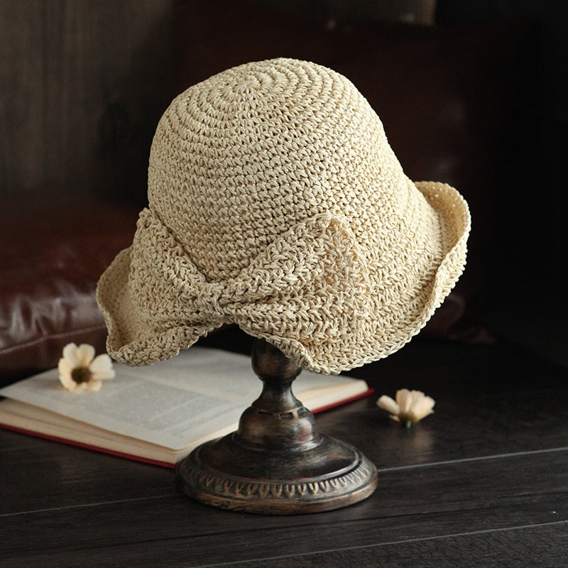 Sommerhatt for kvinner med elegant bred brem, perfekt for sol og strand