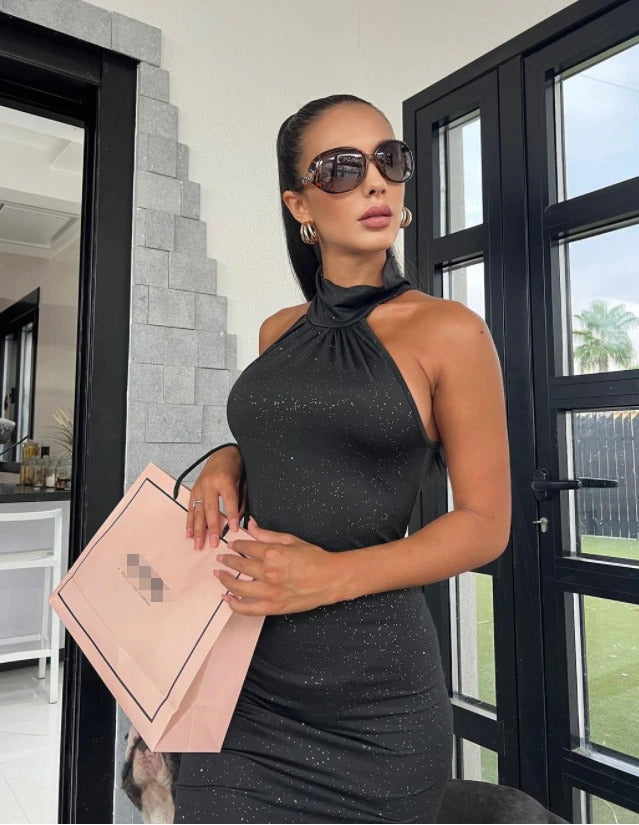 Langermet svart glitter bodycon festkjole, en elegant damekjole for spesielle anledninger.