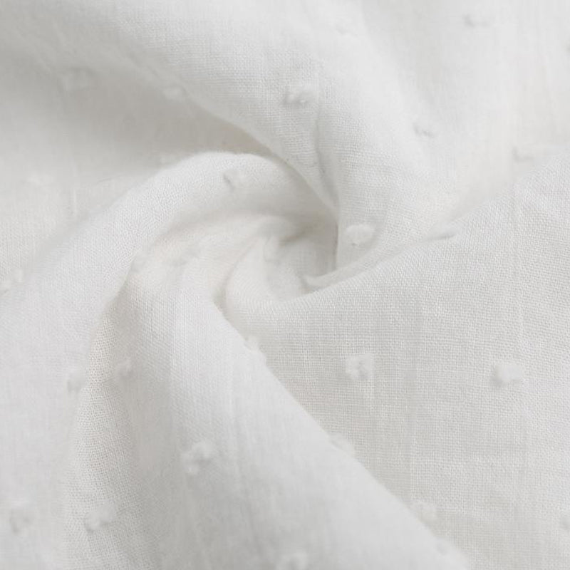 "Elegant utsvinget bomullsbluse for kvinner med raffinert krage og lange ermer, perfekt for høstsesongen."