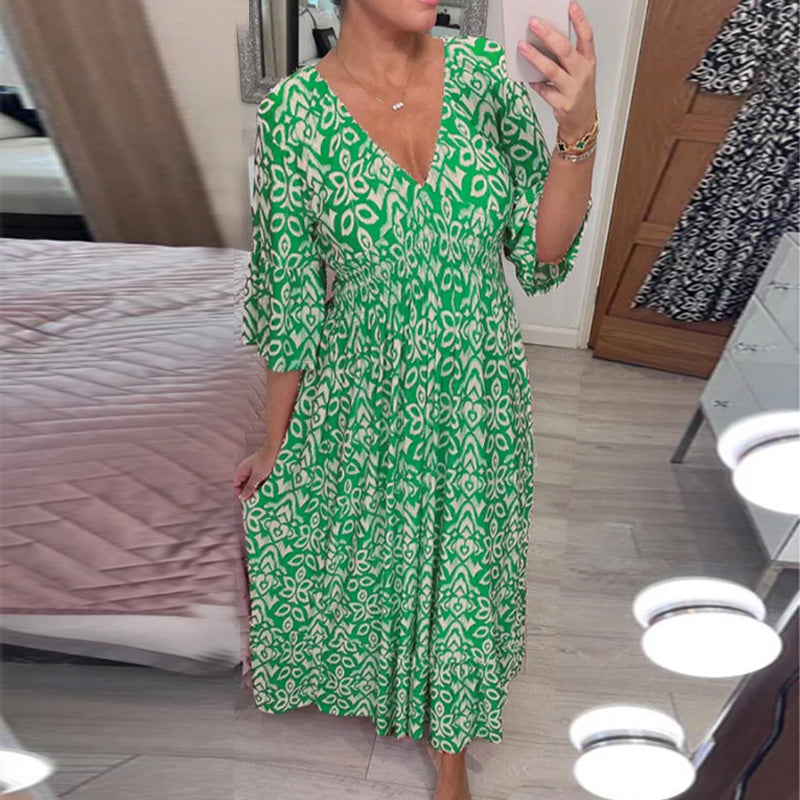 "Elegant V-hals maxi-kjole foran med flare-ermer og fargerikt trykk for kvinner. Perfekt A-line passform for vår og sommer."