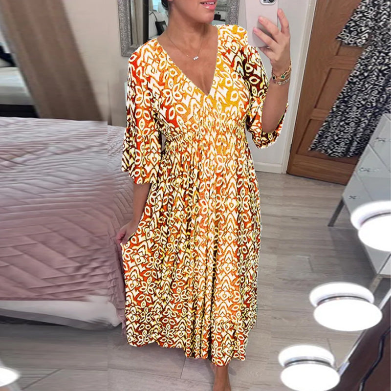 "Elegant V-hals maxi-kjole foran med flare-ermer og fargerikt trykk for kvinner. Perfekt A-line passform for vår og sommer."