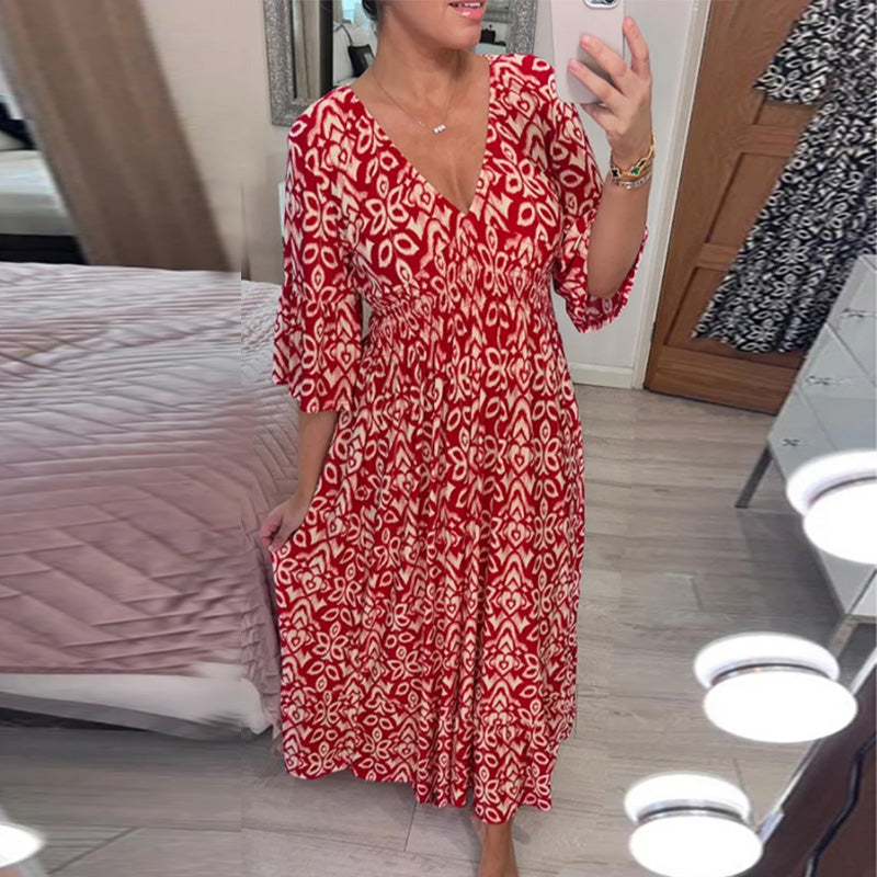"Elegant V-hals maxi-kjole foran med flare-ermer og fargerikt trykk for kvinner. Perfekt A-line passform for vår og sommer."