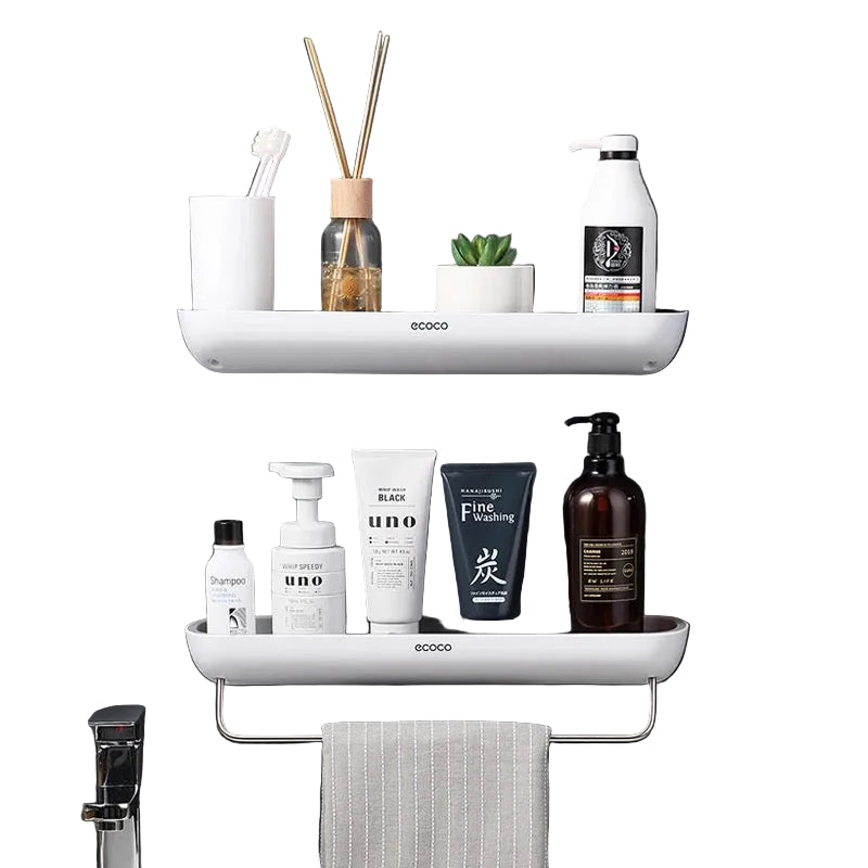 Elegant veggmontert baderomsarrangør med integrert håndklestativ for plassbesparende oppbevaring på badet.