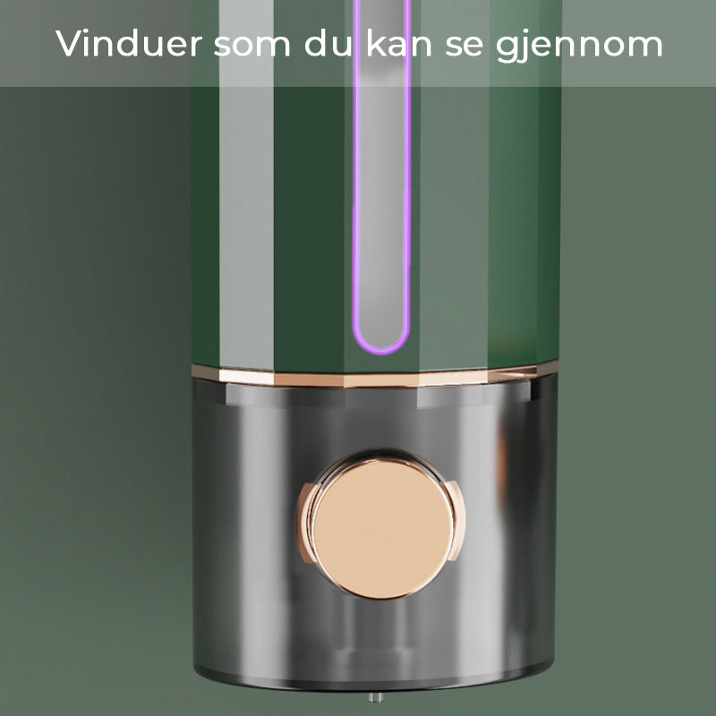 "Elegant veggmontert manuell såpedispenser i hvit, transparent kropp, praktisk for moderne baderom, lett å fylle."