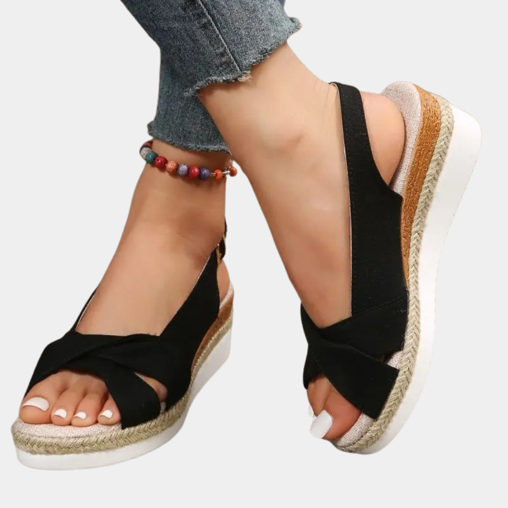 "Elegante kvinne sandaelskiler i flere farger med lav kilehæl, gir optimal støtte og komfort for sommersesongen."
