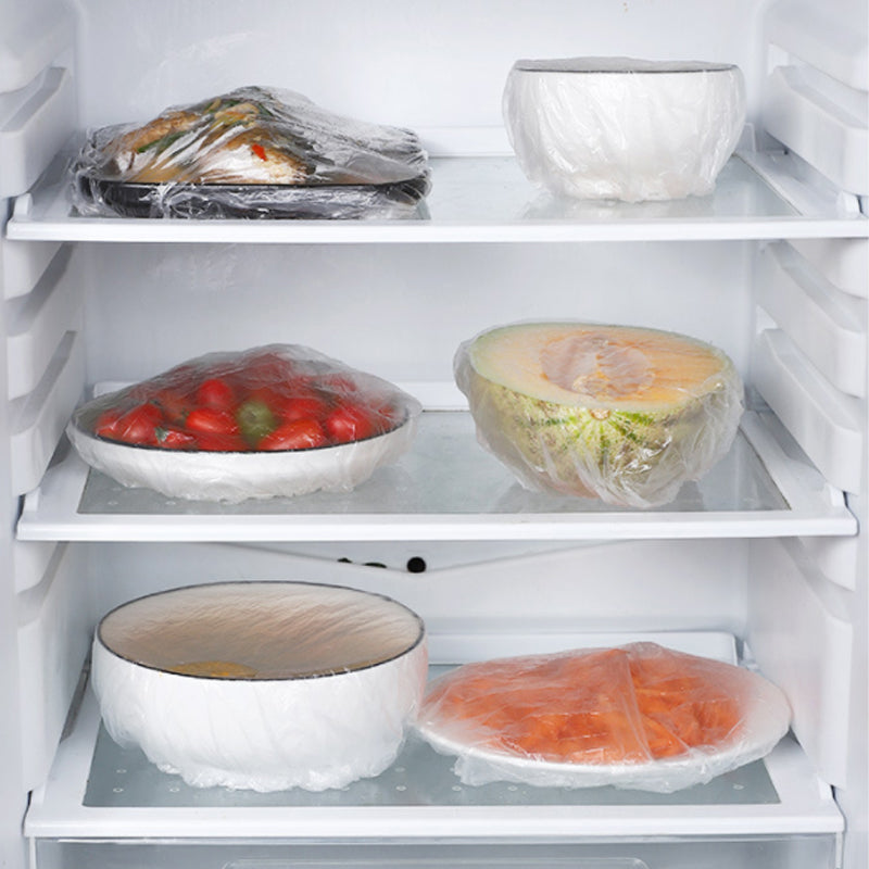 "Engangs plastdeksel for matbeskyttelse, gjennomsiktig med elastisk bånd, passer serviser 25 cm diameter."