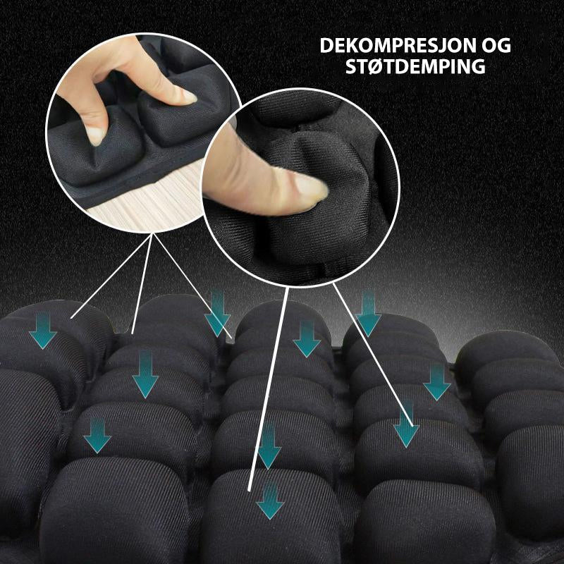 "Ergonomisk 3D-motorsykkelpute, svart flercelledesign, optimal komfort og vibrasjonsdemping for langdistansekjøring."
