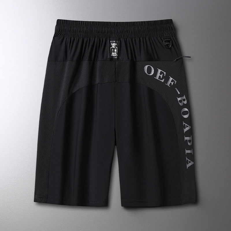 "Ergonomiske sportsshorts, elastisk snørebelte, sommerlig design, lett stoff, ideell for utendørs aktiviteter."
